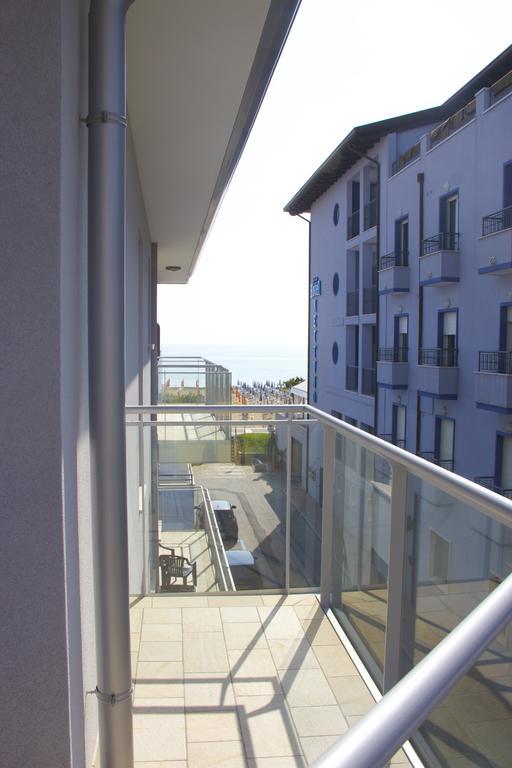 Residence La Perla Caorle Kamer foto